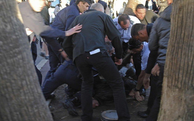 a man is detained by police and local security after shooting on the sidelines of the cannes film festival near the grand journal de canal television studio set on the croisette in cannes may 17 2013 photo reuters a man is detained by police and local security after shooting on the sidelines of the cannes film festival near the grand journal de canal television studio set on the croisette in cannes may 17 2013 photo reuters
