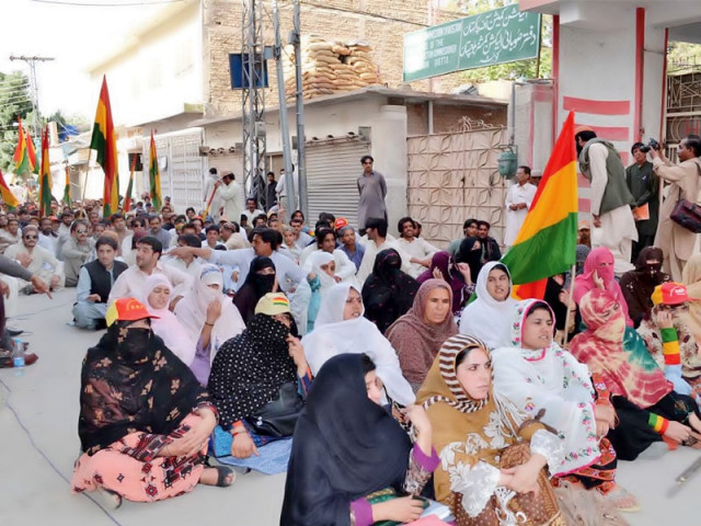 bnp m supporters stage a sit in outside the provincial election commission s office in quetta photo banaras khan express bnp m supporters stage a sit in outside the provincial election commission s office in quetta photo banaras khan express