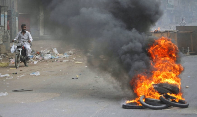 file photo of burning tyres and blocking roads photo reuters file file photo of burning tyres and blocking roads photo reuters file