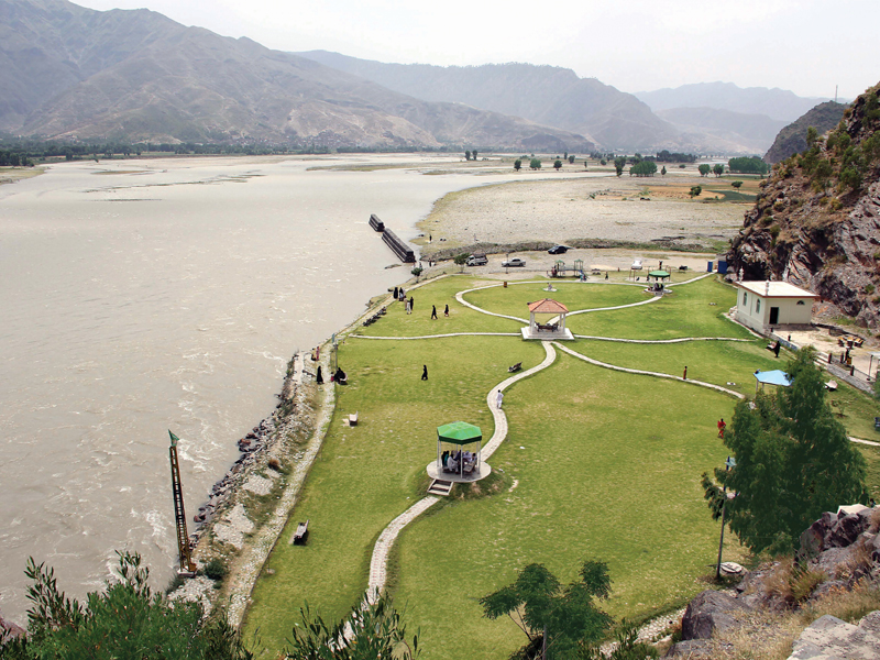 river s cool water surrounding mountains and pleasant weather makes the jarral park a serene place for a vacation photo fazal khaliq express