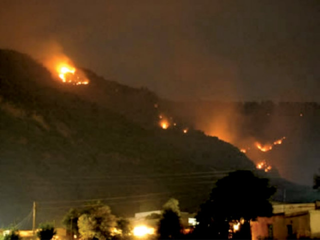 a fire on the margalla hills in 2010 photo file a fire on the margalla hills in 2010 photo file