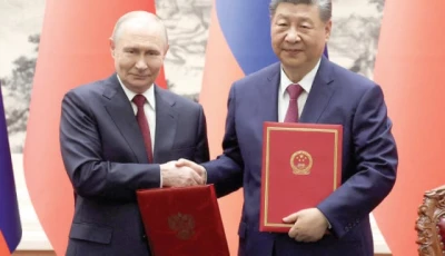 chinese president xi jinping and russian president vladimir putin shake hands during a signing ceremony at the great hall of the people in beijing photo reuters