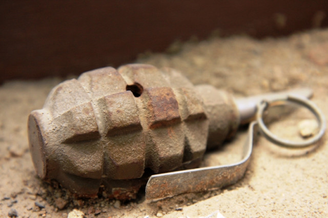 initial police reports suggest that the hand grenade was thrown by unknown men on motorbikes who immediately fled photo file initial police reports suggest that the hand grenade was thrown by unknown men on motorbikes who immediately fled photo file
