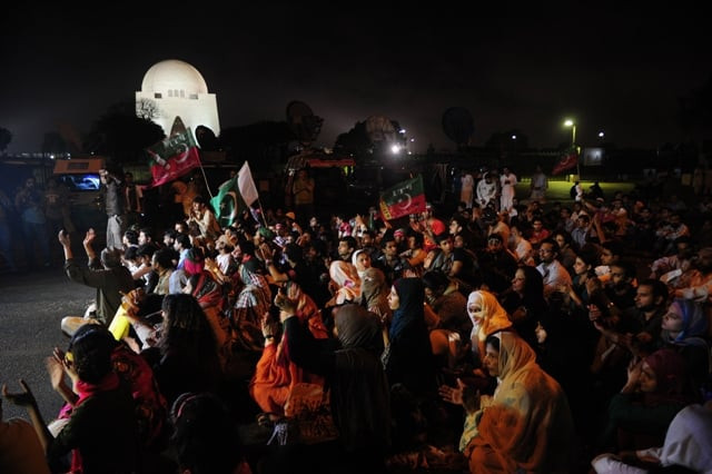 supporters of pti take part in a protest against the killing of sindh provincial party leader zahra hussain in karachi on may 20 2013 photo afp