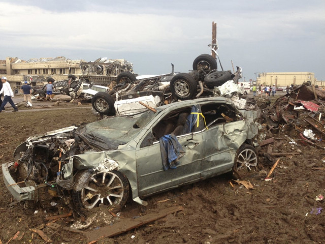 overturned cars are seen from destruction from a huge tornado near oklahoma city oklahoma photo reuters overturned cars are seen from destruction from a huge tornado near oklahoma city oklahoma photo reuters