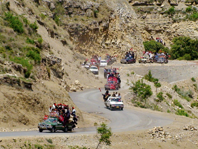 supporters of awami national party rallying on the road for the first time in orakzai agency photo express supporters of awami national party rallying on the road for the first time in orakzai agency photo express