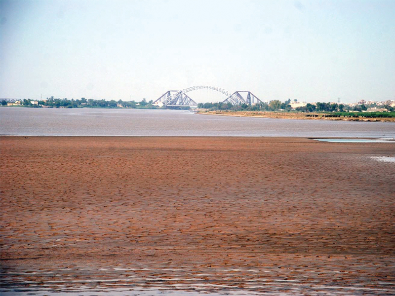 the water scarcity is evident in this dry section of the sukkur barrage it is expected that the situation will improve soon as the snow melts due to the prevalent heat wave photo naeem ahmed ghouri express