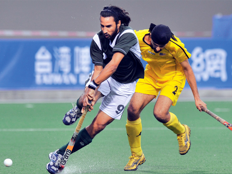 shakeel abbasi rested for the azlan shah cup has been included in the probables list after the phf thought the team needed experienced players photo afp