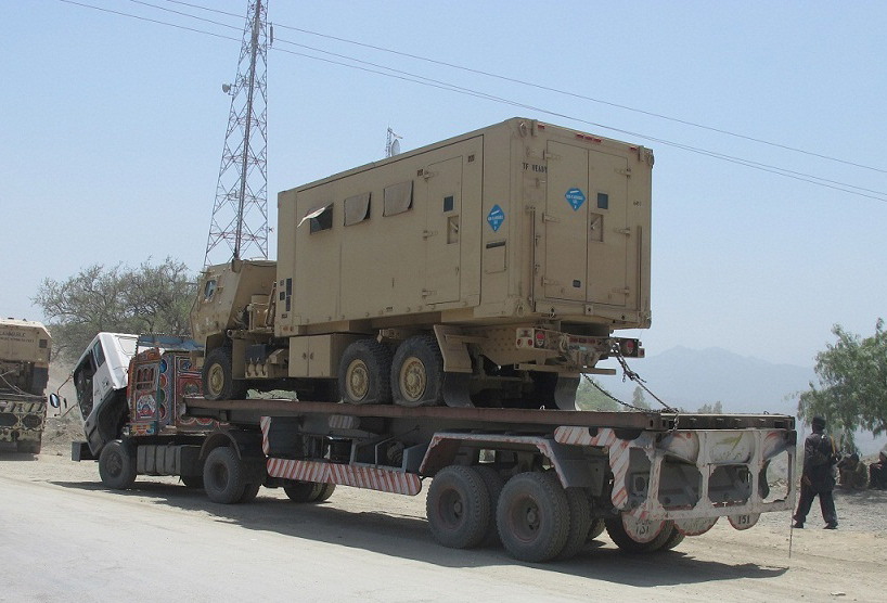 the convoy of containers was headed to karachi from the neighbouring country when it came under attack at around 10 30am says a khasadar line officer photo express