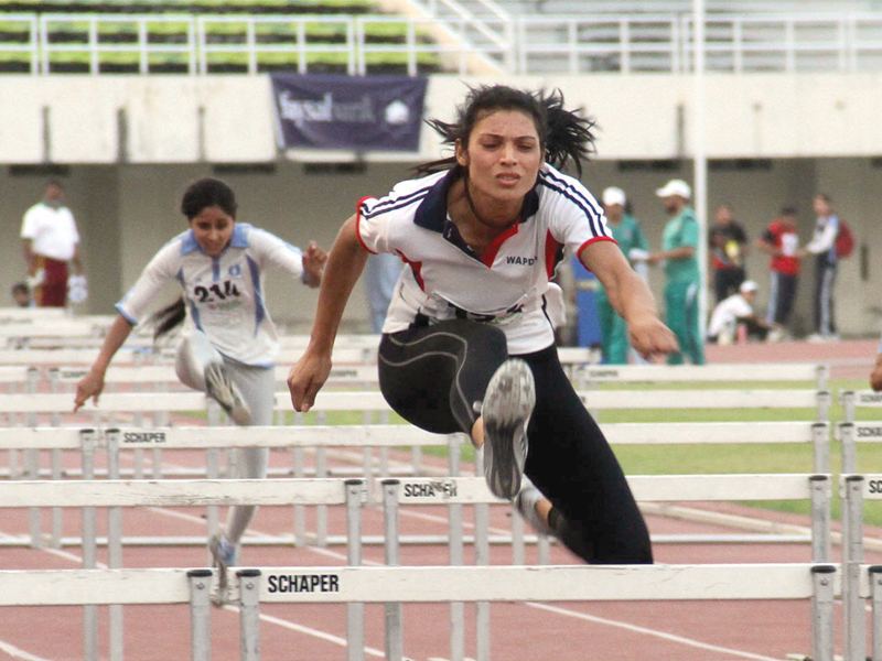 wapda atheletes shone on the opening day of the national athletics championship yesterday photo inp