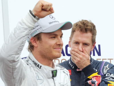 rosberg claims pole position after rain hit qualifying