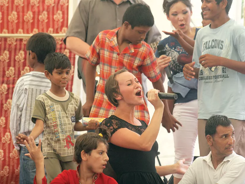 vocalists dallas brown and fran hart dance along with the crowd as they perform their songs at darul sukun on sunday photo express vocalists dallas brown and fran hart dance along with the crowd as they perform their songs at darul sukun on sunday photo express