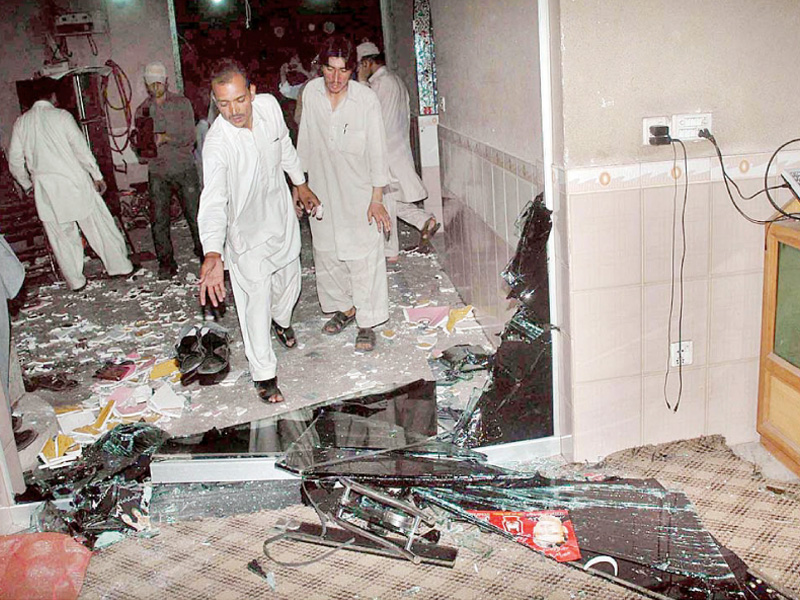 a view of the destruction caused by a blast in imamia colony gulbhar photo file