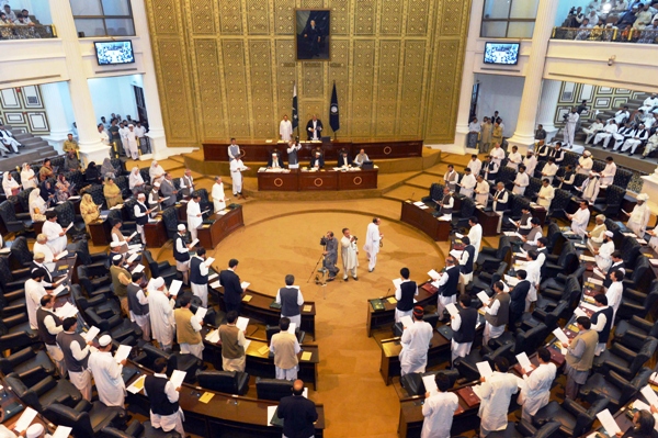 newly elected northwestern khyber pakhtunkhwa provincial assembly members take an oath at the provincial assembly building in peshawar on may 29 2013 photo afp