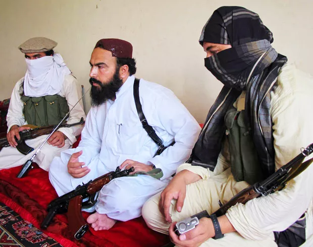 flanked by militants wali ur rehman centre deputy pakistani taliban leader speaks to reporters in shawal a town that lies between north and south waziristan photo reuters file flanked by militants wali ur rehman centre deputy pakistani taliban leader speaks to reporters in shawal a town that lies between north and south waziristan photo reuters file