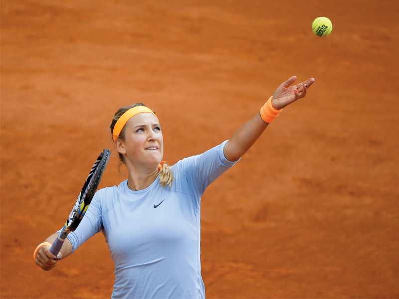 making her eighth main draw appearance at the french open victoria azarenka won her first round match against elena vesnina 6 1 6 4 after it was cancelled on tuesday due to heavy rain photo afp