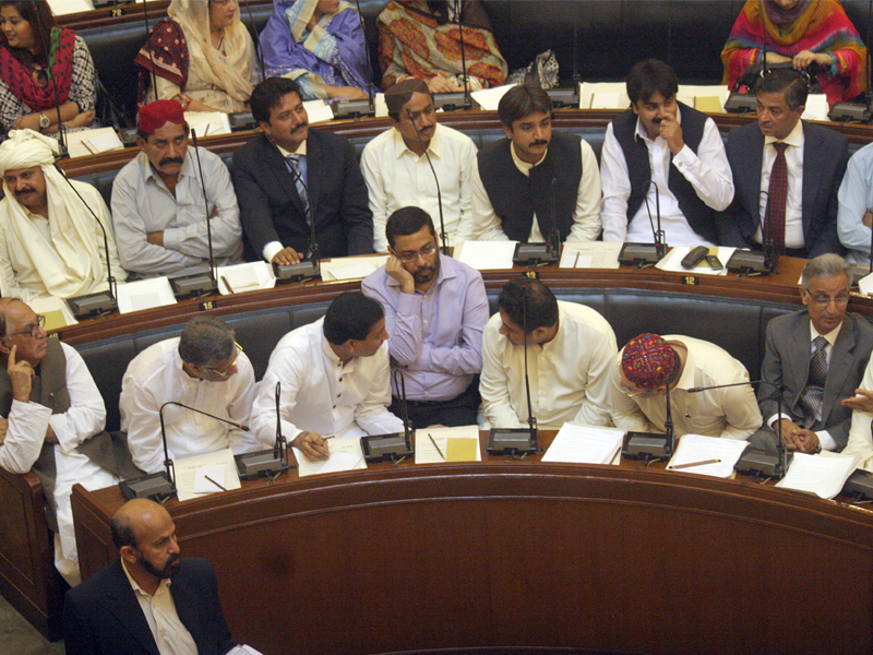 a collage of former sindh chief ministers is on display at the sindh assembly building where the 14th assembly started its first session on wednesday mqm legislators faisal subzwari and sagheer ahmed are deep in conversation with ppp s owais muzaffar and sharjeel memon photo athar khan express