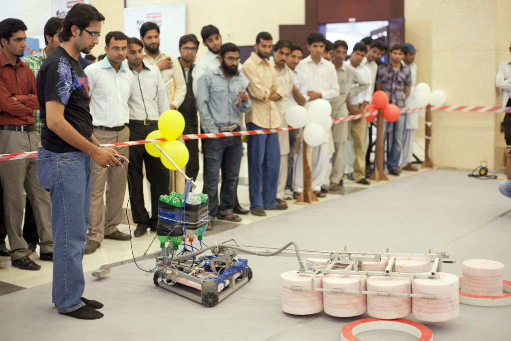 an exhibition of robotics skills was underway with young graduates from different universities showing off their projects photo myra iqbal express