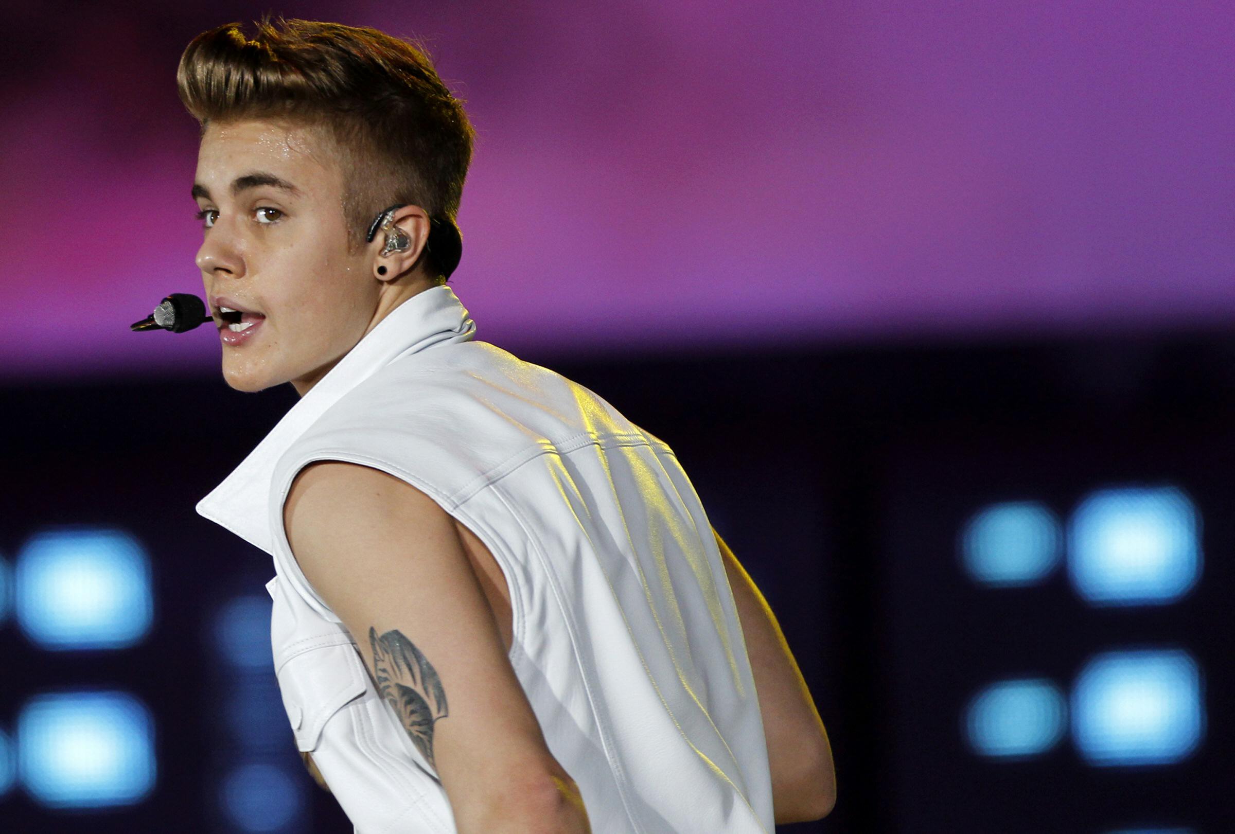 canadian singer justin bieber performs on stage during a concert as part of his 039 039 believe 039 039 world tour photo reuters