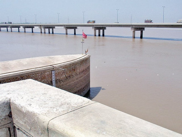 the red flag at the end of the pier between gates 32 and 33 of the sukkur barrage is a spot where the spirit of a saint is said to reside photo express the red flag at the end of the pier between gates 32 and 33 of the sukkur barrage is a spot where the spirit of a saint is said to reside photo express