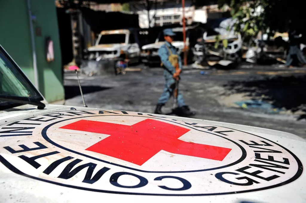 in a file picture taken on may 30 2013 an afghan policeman stands guard beside the burnt out wreckage of vehicles of the international red cross after an attack in jalalabad photo afp in a file picture taken on may 30 2013 an afghan policeman stands guard beside the burnt out wreckage of vehicles of the international red cross after an attack in jalalabad photo afp