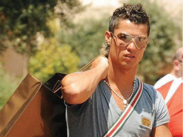 when not playing ronaldo is spotted sporting sexy clothes with branded leather belts slim fit shirts and polo tees boot cut jeans and high top sneakers when not playing ronaldo is spotted sporting sexy clothes with branded leather belts slim fit shirts and polo tees boot cut jeans and high top sneakers
