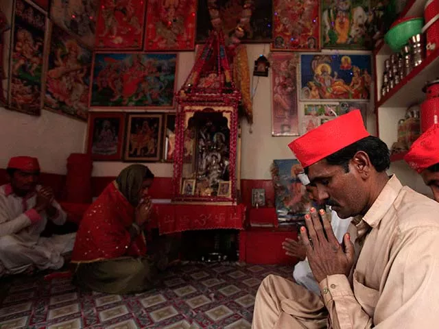members of hindu community pray inside a temple in rahim yar khan march 27 2014 photo reuters members of hindu community pray inside a temple in rahim yar khan march 27 2014 photo reuters