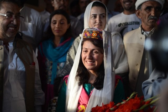 samina baig the first pakistani woman climber to summit the world 039 s highest peak mount everest smiles on her arrival at benazir airport in islamabad on june 3 2013 photo afp