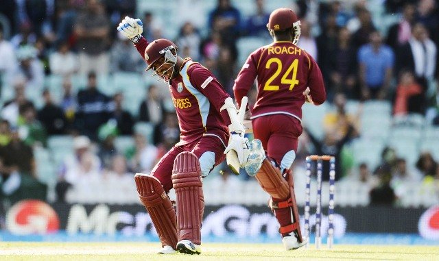 west indies 039 denesh ramdin l and kemar roach celebrate as their team sealed a two wicket win over pakistan photo reuters