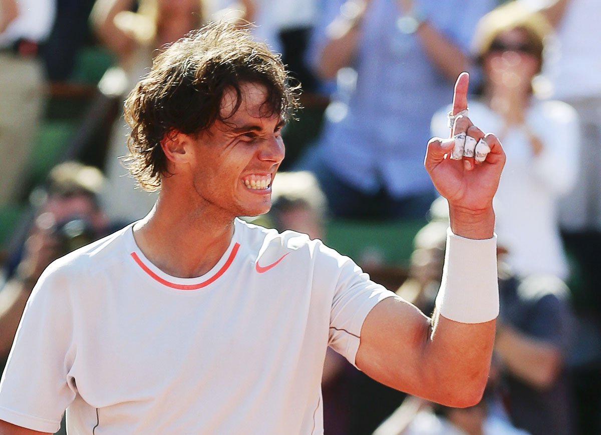 rafael nadal of spain celebrates defeating novak djokovic of serbia in their men 039 s singles semi final match during the french open tennis tournament photo reuters