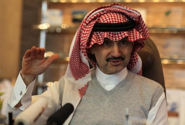 saudi prince alwaleed bin talal speaks during an interview with reuters at his offices in kingdom tower in riyadh may 6 2013 photo reuters