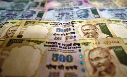 india s rupee hits record low against the dollar
