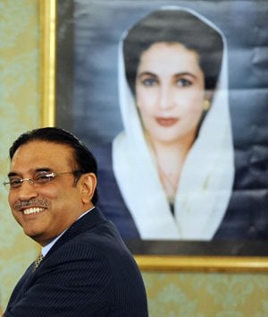 file photo of president zardari in front of benazir bhutto 039 s portrait photo express file