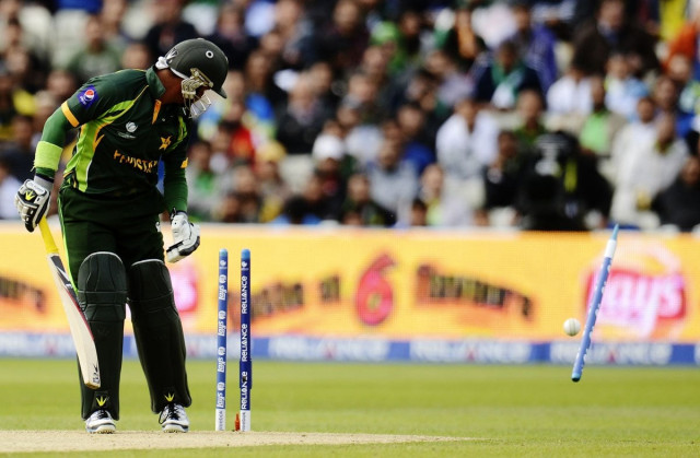 batsman imran farhat watches as his wicket cart wheels away after being bowled during their champions trophy match against south africa on monday photo reuters batsman imran farhat watches as his wicket cart wheels away after being bowled during their champions trophy match against south africa on monday photo reuters