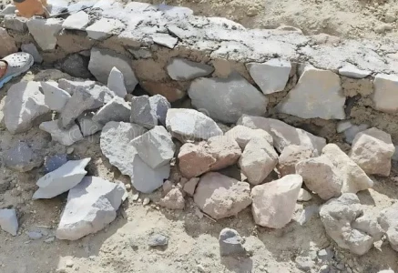 construction work buries foundation stone
