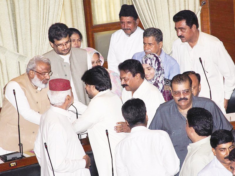 mpas congratulate dr arbab ghulam rahim after he took oath at the sindh assembly session on tuesday the security around him was tightened as a shoe had been lobbed at dr rahim back in 2008 photo online