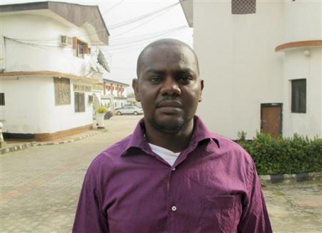 harrison okene 29 poses for a photograph after an interview with reuters outside an hotel in nigeria 039 s oil city of warri june 12 2013 photo reuters harrison okene 29 poses for a photograph after an interview with reuters outside an hotel in nigeria 039 s oil city of warri june 12 2013 photo reuters