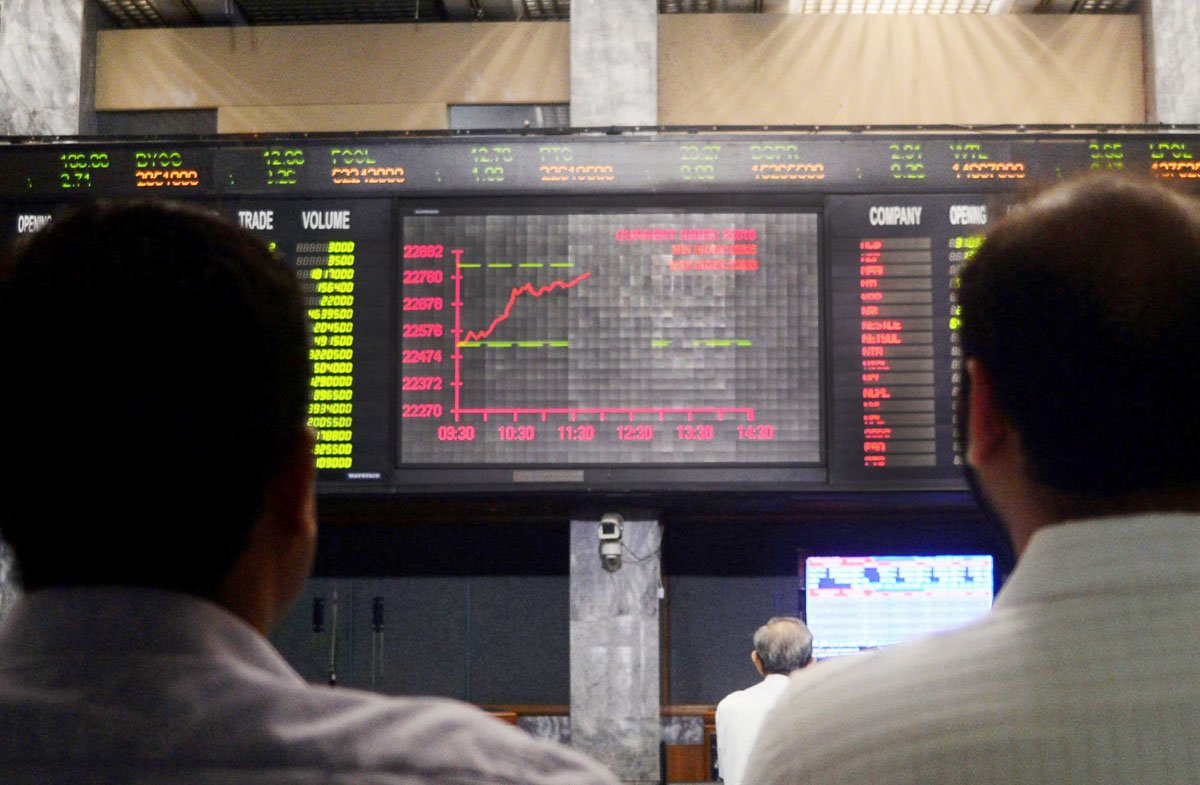 stockbrokers watch the latest share prices during a trading session at the karachi stock exchange kse in karachi on june 13 2013 photo afp