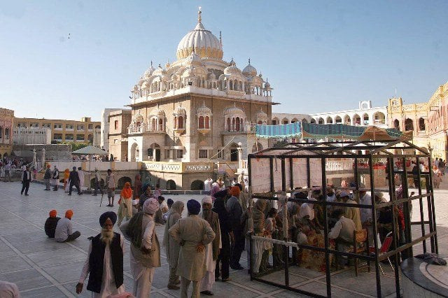 sikh pilgrims performing religious duties at gurdwara panja sahib on the occasion of baba guru nanak dev s 543rd birth anniversary photo inp sikh pilgrims performing religious duties at gurdwara panja sahib on the occasion of baba guru nanak dev s 543rd birth anniversary photo inp