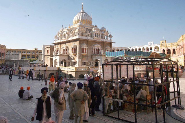 sikh pilgrims performing religious duties at gurdwara panja sahib on the occasion of baba guru nanak dev s 543rd birth anniversary photo inp