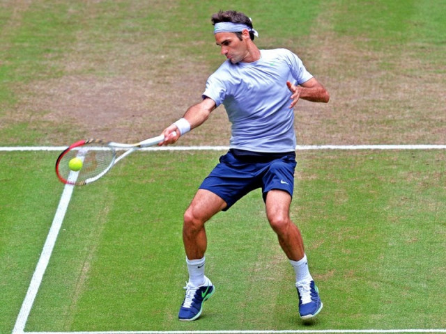 world number three federer edged closer to his first title of the season when he beat defending champion haas 3 6 6 3 6 4 at the halle open semi final yesterday photo afp