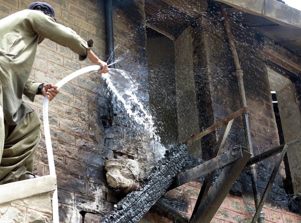 fire fighters struggling to extinguish the fire which erupted in quaid e azam 039 s residency in ziarat after militants blew the house up late on friday photo inp