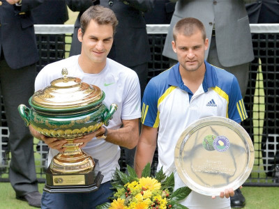 halle open federer claims first title of season