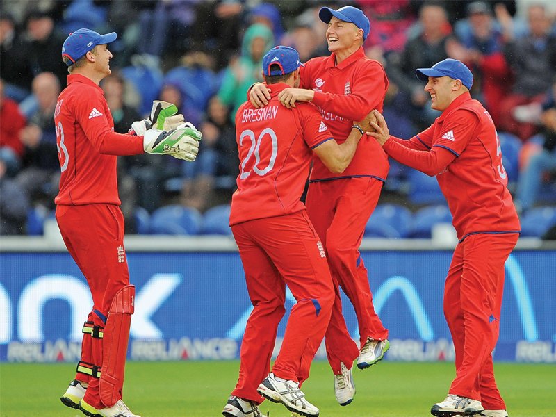 england overcame weather trouble and new zealand s attack to progress to the last four joining india and south africa photo afp