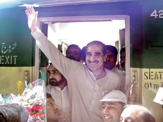 railways minister khwaja saad rafiq waving to railway employees upon his arrival at rawalpindi photo app railways minister khwaja saad rafiq waving to railway employees upon his arrival at rawalpindi photo app