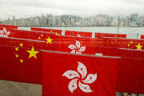 china and hong kong s flags are hung outside a shopping mall ahead of the 100th founding anniversary of the communist party of china in hong kong china june 28 2021 photo reuters