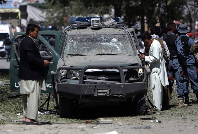 afghan security forces personnel investigate the site of an explosion in kabul june 18 2013 photo reuters