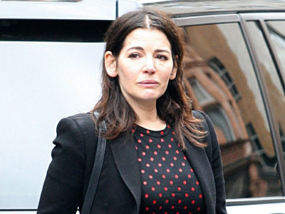 saatchi trivialises restaurant incident as playful tiff