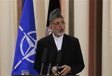 afghan president hamid karzai speaks during a joint news conference following a security handover ceremony at a military academy outside kabul photo reuters file