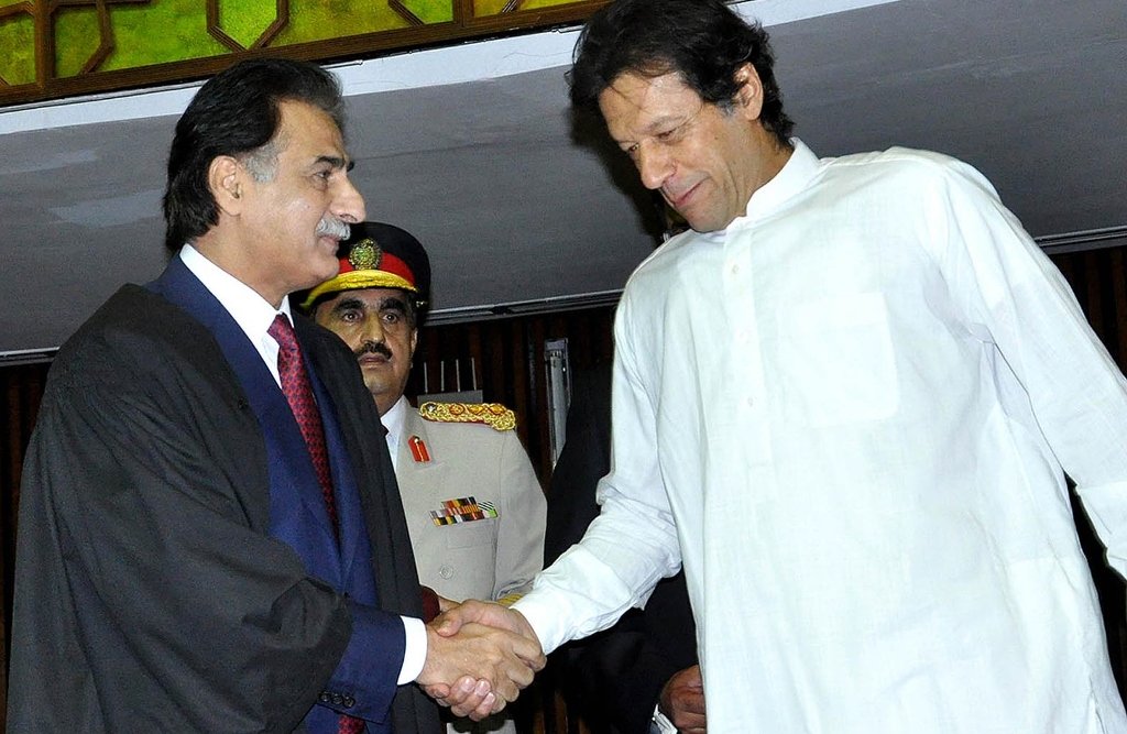 pti chairman imran khan shakes hands with national assembly speaker sardar ayaz sadiq after taking oath photo nni